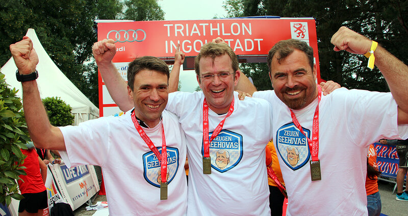 Drei glückliche Abgeordnete beim Triathlon: Stefan Müller, Reinhard Brandl und Florian Hahn
